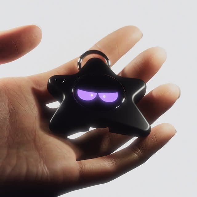 Oneira working prototype resting in an open palm with its display lit — unretouched photo