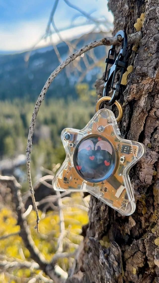 Oneira working prototype held up outdoors on a hiking trail — unretouched photo