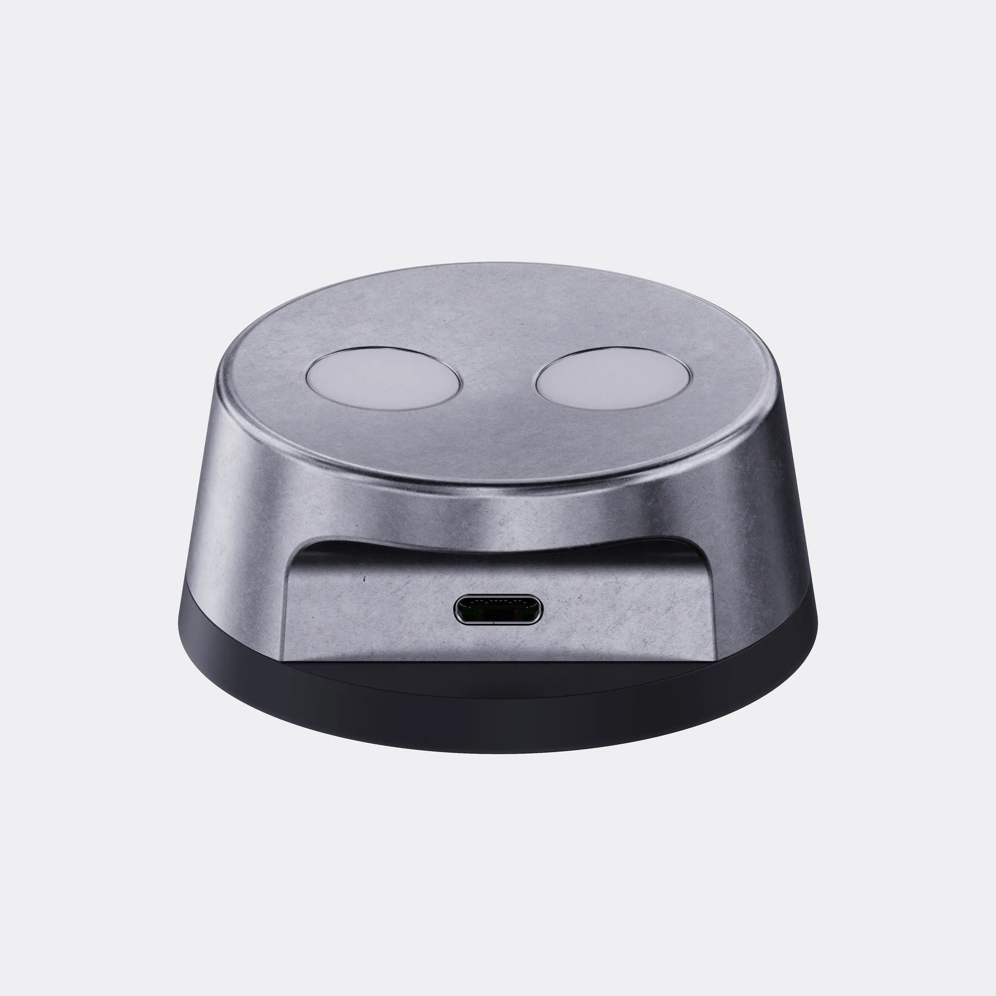 Silver o1 dock with two circular recesses and a USB-C port